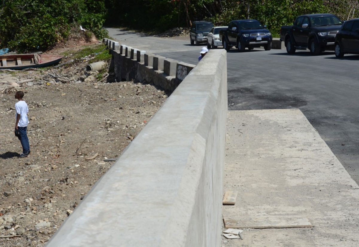 Sections of the Robin’s Bay bridge in St. Mary, which has been rehabilitated at a  cost of $33 million. The three-month project, which was financed by the Ministry of Transport, Works and Housing, was implemented by the National Works Agency (NWA), and executed by the engineering firm, Dwight’s Construction Limited.    