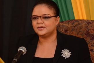 Minister with responsibility for Information, Senator the Hon. Sandrea Falconer, addresses journalists at a Jamaica House press briefing, held at the Office of the Prime Minister on June 6. (FILE)