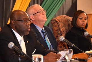 Health Minister, Hon. Dr. Fenton Ferguson (left), says the ban on smoking in specific areas is intended to reduce the unwanted effects of tobacco exposure on members of the public. The Minister was addressing journalists during a press briefing at the Office of Prime Minister on Monday (July 15). Also pictured are: Education Minister, Rev. the Hon. Ronald Thwaites (second left), and Legal Officer, Ministry of Health, Sheryl Dennis.