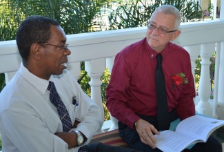 Minister of Education, Hon. Rev. Ronald Thwaites (right), in discussion with past President of the Jamaica Teachers' Association, Ray Howell, at the annual conference of the Association of Principals and Vice-Principals, held at the Grand Palladium Resort and Spa in Lucea, Hanover, on October 17.  The conference was held under the theme: 'Changing the education landscape:
promoting diversity and effectiveness through leadership'.
