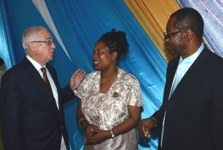 Minister of Education, Hon. Rev. Ronald Thwaites (left), converses with principal of Edwin Allen High School, Rev. Dr. Everton Walters and niece of the late Edwin Leopold Allen, Mrs. M. Gaynor, at the school’s 50th anniversary celebrations in Frankfield, Clarendon, on January 27.