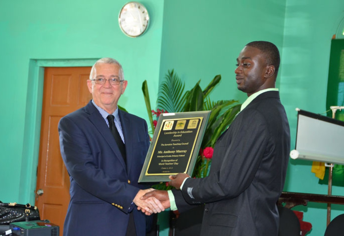 Education Minister Presents Principal With Leadership Award