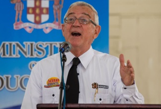 Education Minister, the Hon. Rev. Ronald Thwaites, gives his remarks at the third staging of the Ministry’s Mathematics Exposition held on March 12, at the Old Library grounds at the University of the West Indies (UWI), Mona campus.
