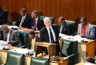 Minister of Education, Hon. the Rev. Ronald Thwaites, during the sitting of the House of Representatives on February 4.