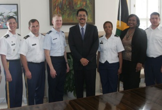 Ambassador to the United States, His Excellency Professor Stephen Vasciannie (fourth right) and Director of Strategic Plans and Training of the District of Columbia National Guard, Lt. Colonel Luis Campbell (fourth left), with (from left), Security Attaché at the Embassy of Jamaica, Stacy Ann Green; Major Mark Escherich, National Guard Bi-lateral Affairs Officer to Jamaica; Major Daniel Gilmore, Senior Southcom Desk Officer; First Lt. Tamara Blassingame, State Partnership Programmes Co-ordinator; Deputy Chief of Mission, Embassy of Jamaica, Mrs. Marsha Coore-Lobban; and Captain Russell Brown at the Embassy of Jamaica,  after the National Guard contingent held discussions with Ambassador Vasciannie, recently.
