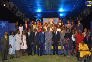 Governor-General, His Excellency the Most Hon. Sir Patrick Allen (7th right, front row), Prime Minister, the Most Hon. Andrew Holness (centre, front row), and Education, Youth and Information Minister, Senator the Hon. Ruel Reid (7th left), with recipients of the 2018 Prime Minister’s Medal of Appreciation for Service to Education, at the award ceremony held at Jamaica House on Wednesday (June 27). Sharing in the occasion are: State Minister in the Ministry of Education, Youth and Information, Hon. Floyd Green (5th left); Permanent Secretary in the Ministry, Dean-Roy Bernard (6th right); South Manchester Member of Parliament, Michael Stewart (6th left), representing Opposition Leader, Dr. Peter Phillips; and Jamaica Teacher's Association President, Georgia Waugh Richards (5th right).