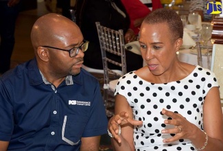 Minister without Portfolio in the Ministry of Finance and the Public Service, Hon. Fayval Williams (right), converses with NCB Insurance Company Limited’s (NCBIC) Managing Director and Chief Executive Officer, Vernon James, at the entity’s pension fund seminar, held at The Jamaica Pegasus hotel, New Kingston, on Tuesday (May 29). Mrs. Williams was the keynote speaker. The seminar was held under the theme: ‘Governance for Pension Funds: A Jamaican Perspective’.