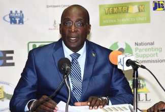 Minister of Education, Youth and Information, Senator the Hon. Ruel Reid, delivers the results of the Grade Six Achievement Test (GSAT) at the Ministry in Kingston on Tuesday (June 5). 
 

