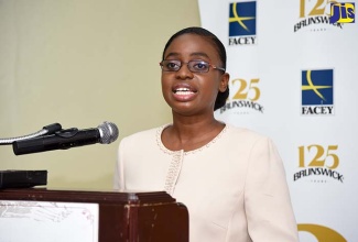 Senior Education Officer at the Ministry of Education, Youth and Information, Alicia Lindsay, addresses Brunswick Jamaica's 2018 Grade Six Achievement Test (GSAT) awards luncheon for three top-performing students held on Monday (July 23) at the Hotel Four Seasons, St. Andrew.