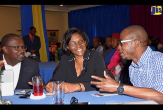 Chairman, HEART Trust/NTA, Edward Gabbidon (left), converses with the agency’s Managing Director, Dr. Janet Dyer (centre); and Founder, President and Chief Executive Officer, E-Media Interactive Group, Tyrone Wilson (right). The occasion was HEART Trust/NTA’s World Entrepreneurs’ Day symposium and workshop, which was held at The Knutsford Court Hotel, New Kingston, on August 21 under the theme ‘Rise on the Heels of Success’.