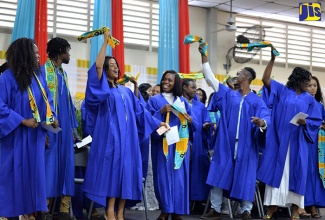 Graduates from the first cohort of the Housing, Opportunity, Production and Employment’s (HOPE) Design and Apparel Manufacturing Corps group celebrate after they received their certificates at HEART Trust/NTA Garmex Academy, on Marcus Garvey Drive, in Kingston, on Wednesday (August 22).