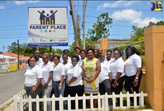 Chief Executive Officer of the National Parenting Support Commission (NPSC), Kaysia Kerr (fifth left, front row),  with parent mentors from Kingston and St. Andrew, St. Thomas, and St. Catherine at the Parent Place, at the Emmanuel Chapel in Mount Salem, St. James. 