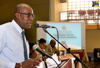 Minister of Education, Youth and Information, Senator the Hon. Ruel Reid, addresses Parent Sensitisation and Consultation Session, held at Glenmuir High School in Clarendon on August 28.