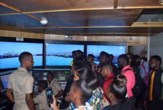 The Bridge Simulator at the Caribbean Maritime University was one of the main attractions of the tour for the Ministry of Justice HOPE Interns.  