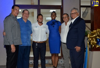 Minister without Portfolio in the Ministry of Economic Growth and Job Creation,  Hon. Karl Samuda (right), with (standing from left) Mayor of Montego Bay and Chairman of the St James Municipal Corporation, Homer Davis; Minister of Industry, Commerce, Agriculture and Fisheries, Hon. Audley Shaw; Isratech’s Vice President of Sales and Marketing, Benjamin Hodara; Miss Jamaica World Cornwall, Issia Thelwell and Chief Executive Officer of Isratech, Shalom Hodara, following the official opening of Isratech’s new retail outlet in Reading, Montego Bay, St James, on  Wednesday (October 10). The new retail outlet offers project engineering and locally manufactured goods, through its business unit, Jamaica Irrigation Drip. 