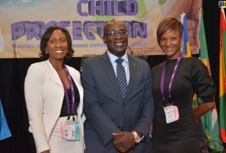 Minister of Education, Youth and Information, Senator the Hon Ruel Reid (centre), with Children’s Advocate, Diahann Gordon Harrison (left) and Editor at B3 (Bump, Baby and Beyond) Magazine and Parenting Lifestyle Consultant, Michelle Gordon, following the closing ceremony of the 2nd Regional Caribbean Conference of the International Society for the Prevention of Child Abuse and Neglect (ISPCAN), held at the Hilton Rose Hall Hotel in Montego Bay, St. James, on Wednesday (December 5).