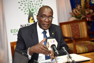 Minister of Education, Youth and Information, Senator the Hon. Ruel Reid, provides an update on school infrastructure projects during a press conference at the Ministry’s Heroes Circle offices in Kingston on February  5. 
