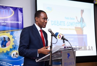Finance and the Public Service Minister, Dr. the Hon. Nigel Clarke, provides an update on the Government’s Public Sector Transformation Programme, at The Jamaica Pegasus hotel in New Kingston recently.