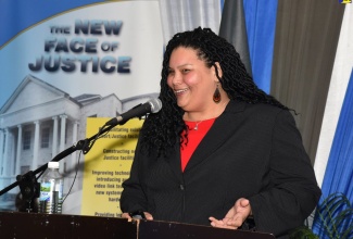 American Fulbright Scholar and Associate Professor of Law at Gongza University, Inga Laurent, addresses the 10th Conference on Restorative Justice, held recently at the Spanish Court Hotel in New Kingston 