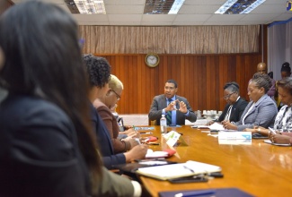 Prime Minister, the Most Hon. Andrew Holness (centre), speaks to leaders in the Ministry of Education, Youth and Information and its agencies, at the Ministry, on Wednesday (March 27). To the Prime Minister’s  left is Acting Permanent Secretary in the Ministry, Dr. Grace McLean. 

