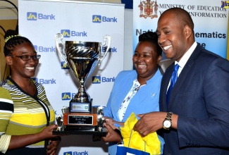 Mathematics Teacher of the Year, Karema Mundell-Thomas (left), accepts her trophy from Acting Permanent Secretary in the Ministry of Education, Youth and Information, Dr. Grace McLean (centre) and Chief, Business Banking, Jamaica National Bank, Ryan Parkes, during the launch of National Mathematics Week and the awards ceremony, on March 25 at the Terra Nova All-Suite Hotel in St. Andrew. 