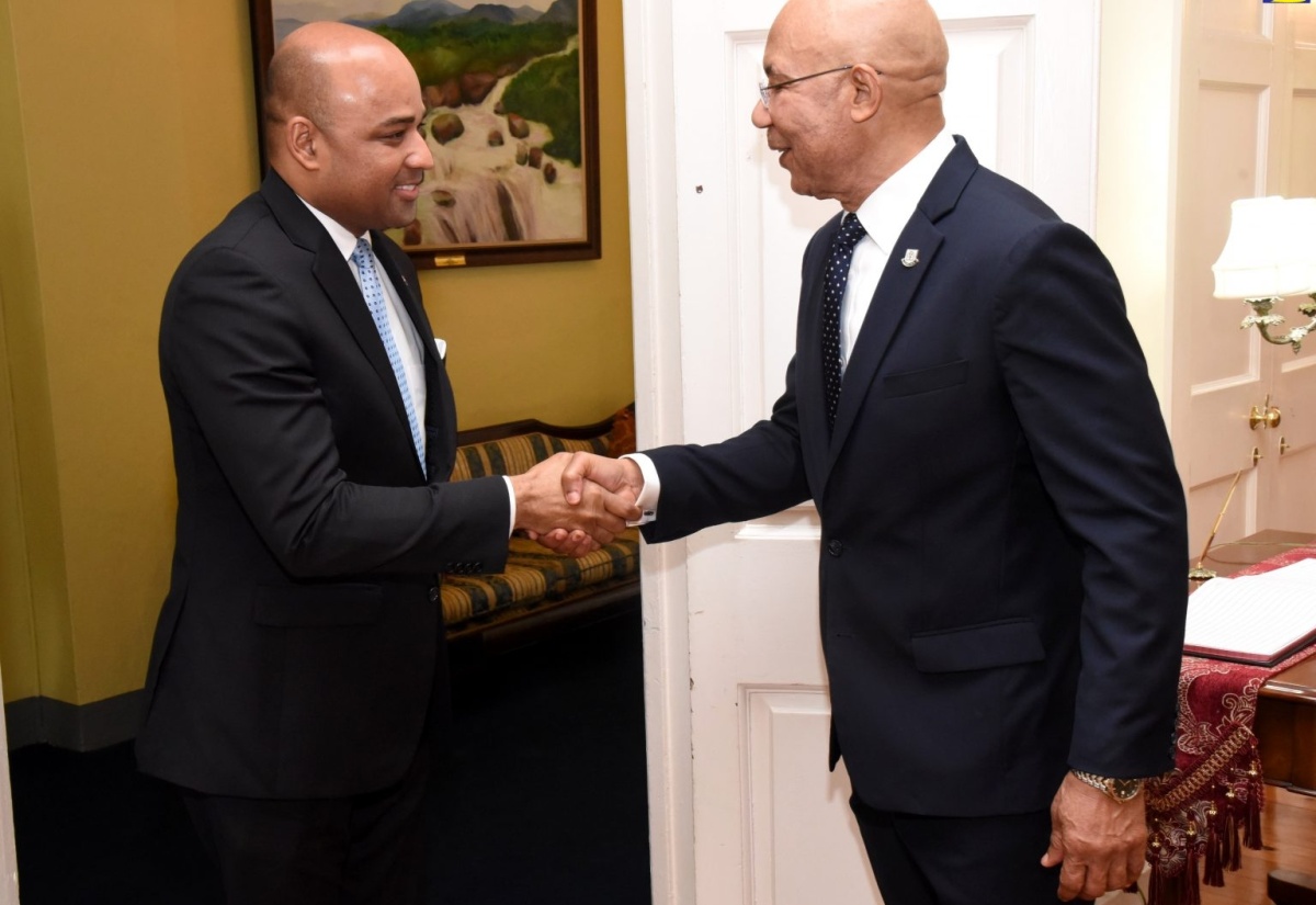 Governor-General, His Excellency the Most Hon. Sir Patrick Allen (right), greets Ambassador Designate of the Dominican Republic, Félix Ramón Garcia Taveras, when he visited King’s House on April 2.