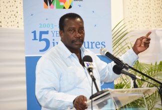 Minister of Transport and Mining, Hon. Robert Montague, speaking at an airport forum held at the Sangster International Airport in Montego Bay in St. James on Friday, May 17. 