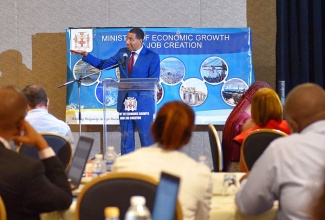  Prime Minister, the Most Hon. Andrew Holness, addresses the Ministry of Economic Growth and Job Creation's Strategic Leadership Retreat at the Moon Palace Jamiaca Grande in Ocho Rios, St. Ann, on June 6.