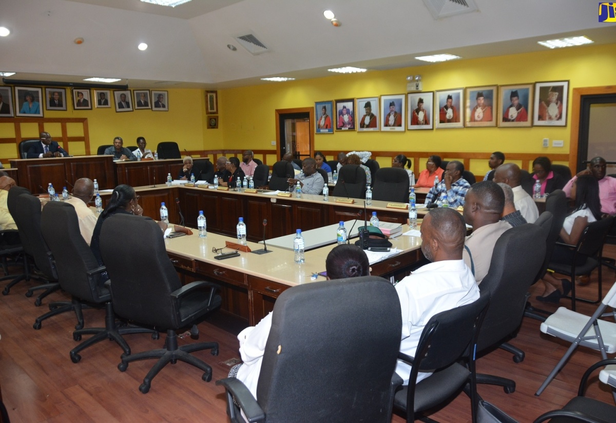 Minister without Portfolio in the Ministry of Economic Growth and Job Creation, Senator the Hon. Pearnel Charles Jr., addresses a meeting at the Manchester Municipal Corporation on Thursday (June 27), to address water challenges affecting communities in the parish.