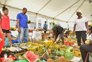 (FILE) A wide array of produce on display at last year's Augus’ Mawnin’ Market at the Independence Village, National Arena in Kingston. This year's Village will be open to the public from August 1 to 6, and will feature a number of family-friendly activities, including booth displays, food courts, lunch-hour concerts, a children’s village and nightly entertainment.

