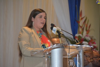 Interim Dean of Academic Affairs at Broward College in Florida, USA, Dr. Elizabeth Molina, speaks at the opening ceremony of the Jamaica Teachers’ Association’s (JTA) 55th Annual Conference, at the Hilton Rose Hall Resort and Spa, in St. James, on Monday, August 19.  