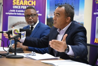 Minister of Health and Wellness, Dr. the Hon. Christopher Tufton (right), addresses journalists at the Ministry’s Quarterly Press Briefing, held on Tuesday (August 27), at the Ministry’s head office in New Kingston. With the Minister is Permanent Secretary in the Ministry, Dunston Bryan.  