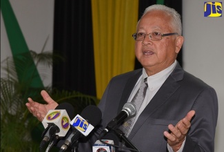 Justice Minister, Hon. Delroy Chuck, addresses members of the audience at the launch of the Legal Aid Council website on Wednesday (September 4), at the Ministry’s Constant Spring Road office in Kingston. The website is intended to increase awareness of the work of the Counil and improve public access to the necessary information and resources available for legal aid.