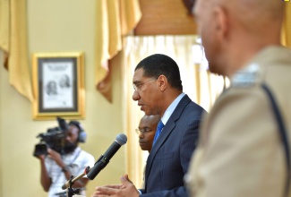 Prime Minister, the Most Hon. Andrew Holness (at podium), addresses a press conference held at Jamaica House on Thursday (September  5), where he announced a State of Public Emergency (SOE) for the parishes of Clarendon and St. Catherine.

