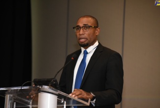 Chief Technical Director, Financial Investigations, Security Policy and Risk Management Affairs, Ministry of National Security, Rohan Richards, speaks at the Asset Recovery Inter-Agency Network of the Caribbean (ARIN-CARIB) Annual General Meeting,  at the Hilton Rose Hall Resort, in St. James, on September 19.