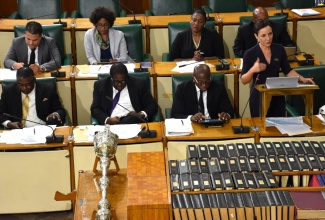 Minister of Foreign Affairs and Foreign Trade and Leader of Government Business in the Upper House, Senator the Hon. Kamina Johnson Smith (standing), emphasises a point while addressing Thursday’s (September 19) sitting of the Senate at Gordon House.