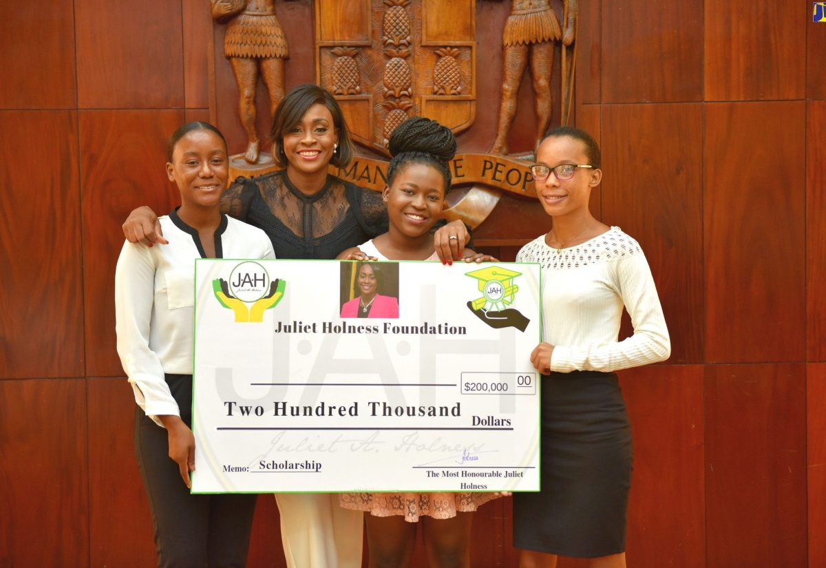 High School And Tertiary Students Receive Scholarships
