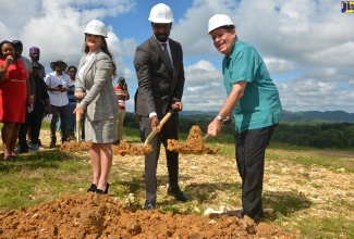 Minister of Industry, Commerce, Agriculture and Fisheries, Hon. Audley Shaw (right), joins Virtudes Company Limited’s Chief Operating Officer, Farrah Zaragan (left), and  the company's  Chief Executive Officer (CEO), Jamiel Jamieson, in breaking ground for the Virtudes Hemp Farm in Lennox Bigwoods, Westmoreland, on Thursday (November 21).