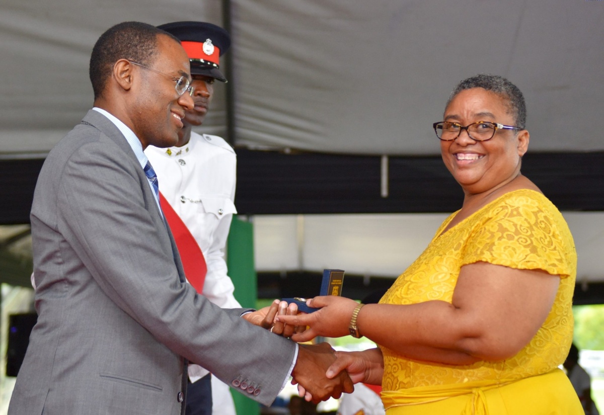 Doctor Proud To Receive A Civil Service Award