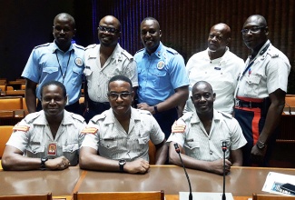 Officers of the Jamaica Constabulary Force at an International Men’s Day 2019 event on November 19, at the Jamaica Conference Centre in downtown Kingston.