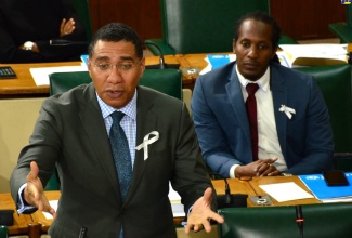Prime Minister the Most Hon. Andrew Holness addressing a special Parliamentary session on violence against children at Gordon House on November 19  