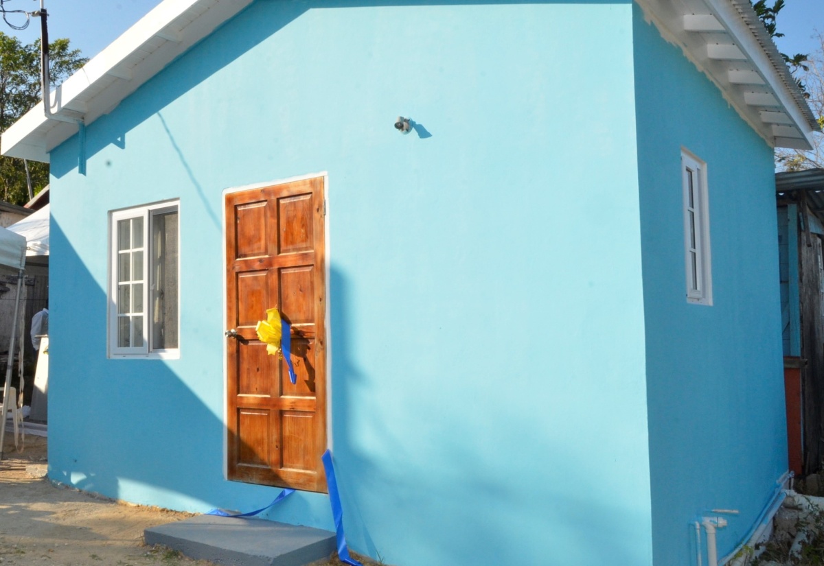 Local Government Minister Hands Over Two Indigent Houses