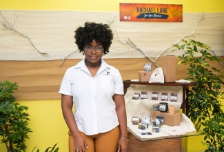 Owner of Rachael Lane, Jo-Ann Morris stands proudly in front of her products. 
