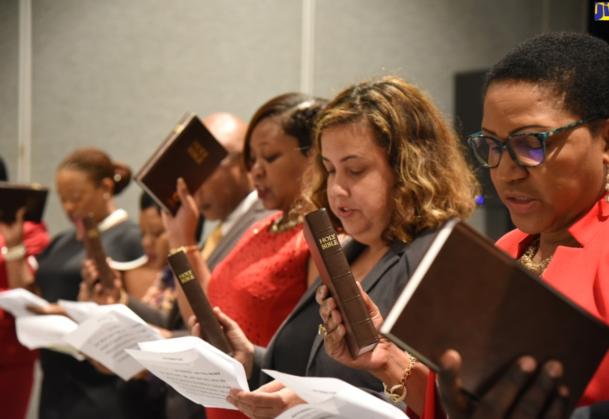 Newly appointed Justices of the Peace for St. Andrew take the oath of office at the commissioning ceremony held at The Jamaica Pegasus hotel in New Kingston on Sunday (February 16).