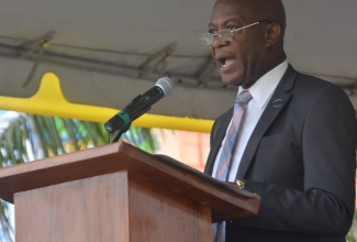 Chief Executive Officer of the Universal Service Fund (USF), Daniel Dawes, addresses stakeholders during the Universal Service Fund’s free secured Internet access (Wi-Fi)  commissioning ceremony, held in Sam Sharpe Square, Montego Bay, St. James, recently . 

