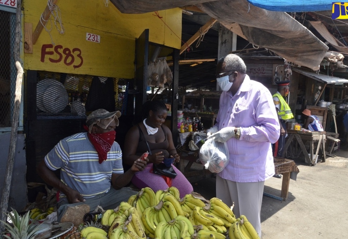 Custos Of St. James Issues Reusable Masks To Vendors In Market