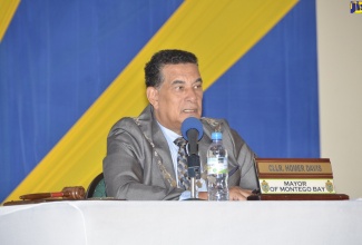 Mayor of Montego Bay, Councillor Homer Davis, addresses the monthly meeting of the St. James Municipal Corporation, held at the Montego Bay Cultural Centre, Sam Sharpe Square on April 9.