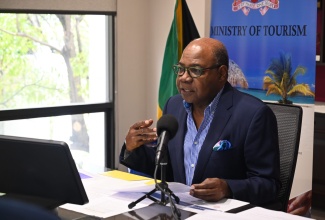 Minister of Tourism, Hon. Edmund Bartlett, addresses a digital press conference on April 17.
