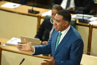 Prime Minister, the Most Hon. Andrew Holness, emphasises a point while moving a Resolution for the extension of the State of Public Emergency (SOE) in the Kingston Western and Kingston Central Police divisions, in the House of Representatives on Tuesday (June 23).
