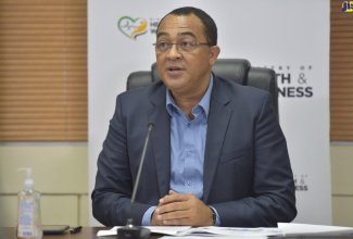 Minister of Health and Wellness, Dr. the Hon. Christopher Tufton, speaking at the regular virtual COVID Conversations press briefing from the Ministry’s head office in New Kingston on Thursday (June 18).​